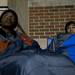 Customers T'ontaye Jones, 14, and Jesse Morris, 15, wait in line for Black Friday deals outside Best Buy late Wednesday night. They were the first in line at 2:00 p.m. Best Buy will open Thursday at midnight. Daniel Brenner I AnnArbor.com